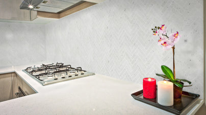 White Carrara Honed 1" X 4" Herringbone kitchen tiles