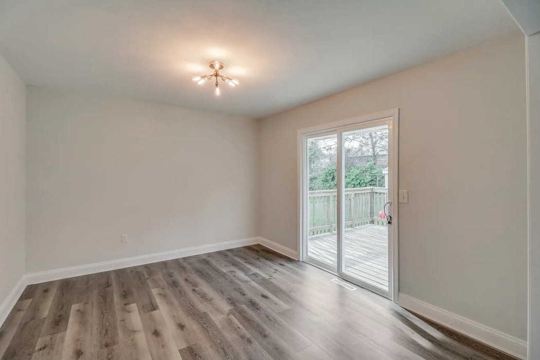 coastal driftwood dark grey luxury vinyl plank flooring for the bedroom