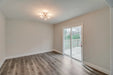 coastal driftwood dark grey luxury vinyl plank flooring for the bedroom