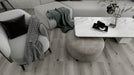 coastal driftwood dark grey lvp flooring in the living room 