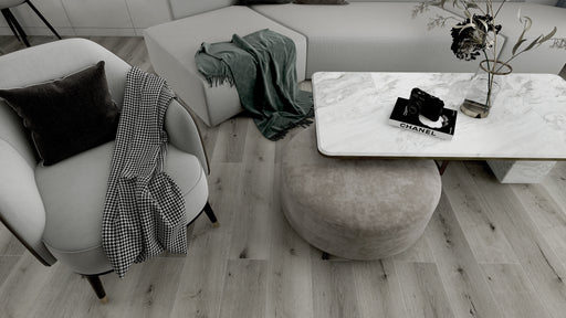 coastal driftwood dark grey lvp flooring in the living room 